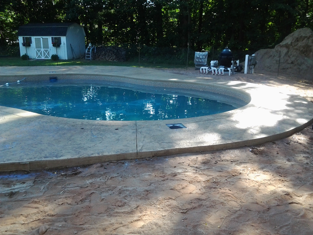 Swimming pool and stamped concrete project example 155